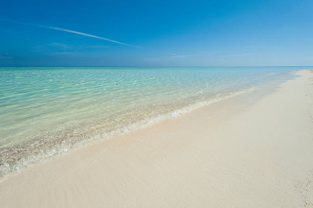 istock Tropical beach on a desert island 158923657