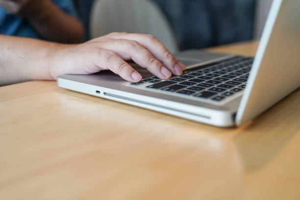 istock Business man working with laptop. Young business man thinking Concentrated at work. 1589240952