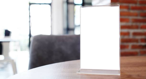 istock Menu frame standing on wood table in Bar restaurant cafe. space for text marketing promotion. 1589241523