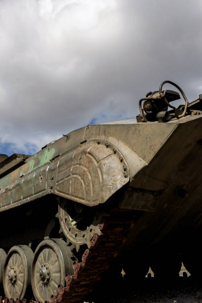 istock Military tank tracks close up. 1589242616