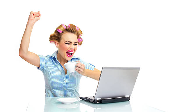 Successful business woman with laptop and coffee stock photo