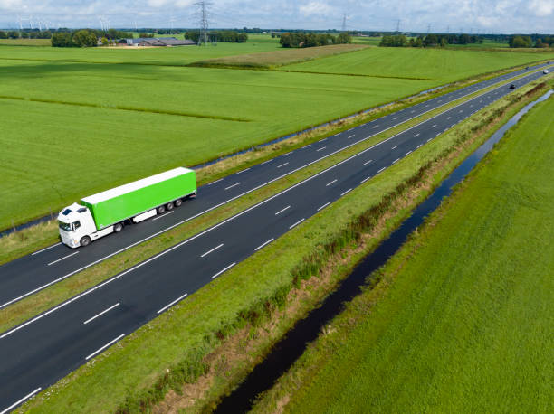 istock Traffic on a highway in the countryside seen from above 1589290849