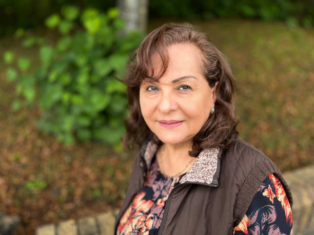 istock Senior Hispanic woman headshot 1589292998