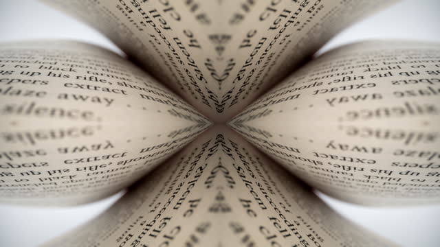 Macro footage of words on pages of a book