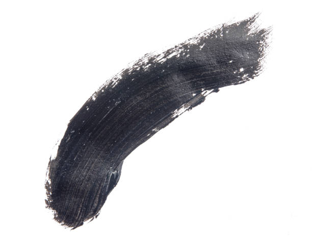 istock Black mascara brush paint strokes isolated on white 1589325172