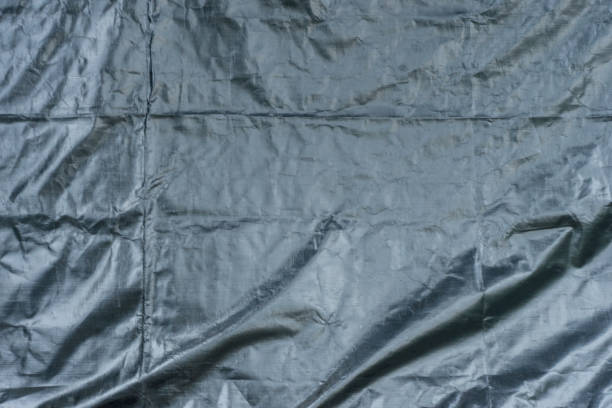 istock Polyester Polypropylene woven fabrics black color detail texture 1589332204