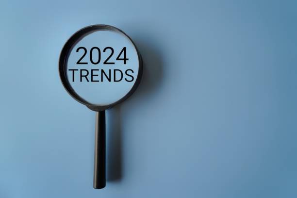 istock Magnifying glass and text 2024 TRENDS on blue background 1589347858