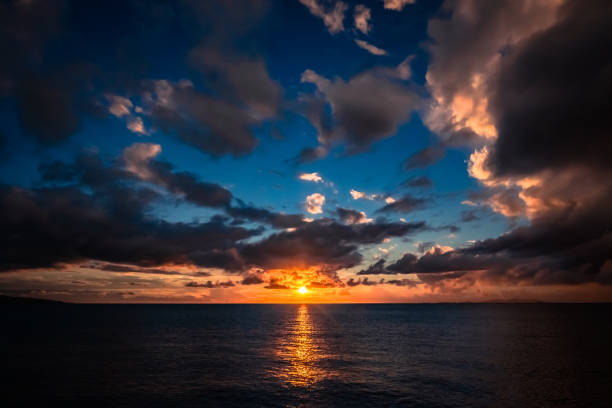 istock Cloudy sunset over The Pacific Ocean in Fiji 1589348947