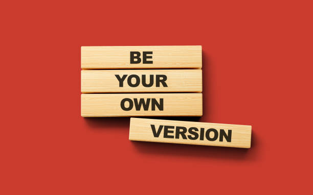 istock Wooden blocks be your own version word 3d illustration 1589371380