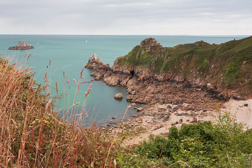 A secluded bay on the Côte de Goëlo, Brittany, France. The area has become a breeding ground for seabirds including gulls, cormorants and the occasional oystercatcher.