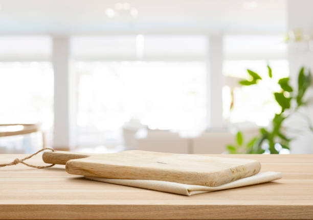 istock Vintage cutting board for food display on blurred restaurant background 1589380125