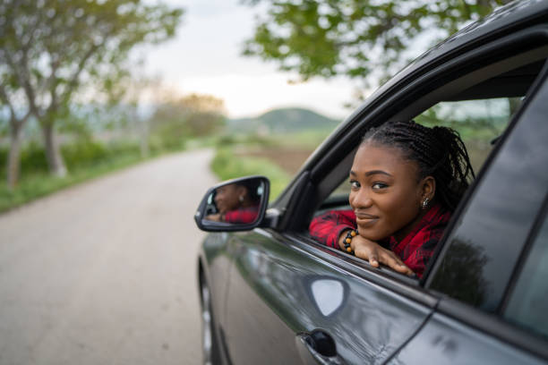istock Woman in a car 1589386058