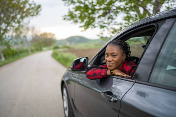 istock Woman sitting in a car 1589387656