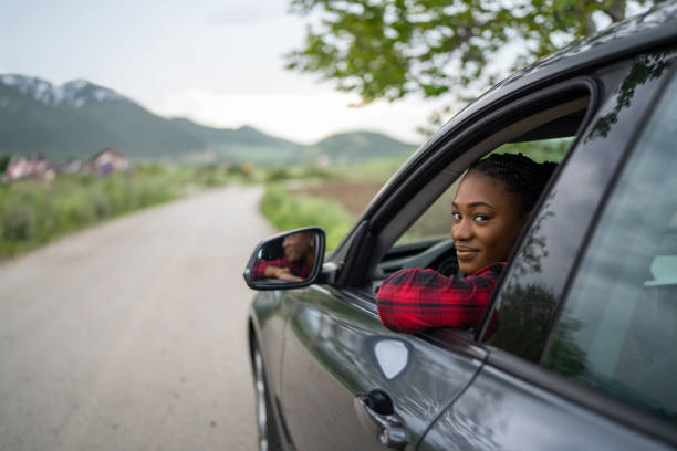 istock Woman driving  a car 1589390967
