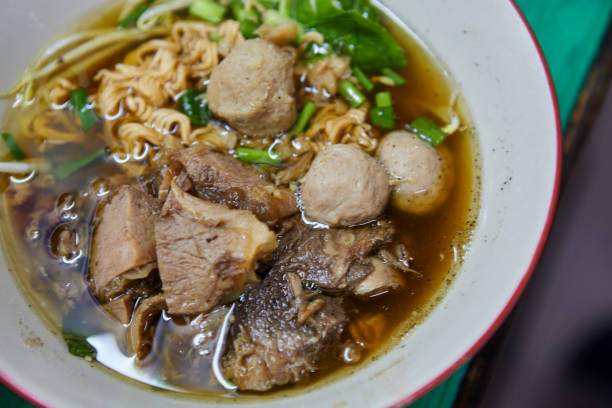Instant noodles with braised beef and meatball in a bowl