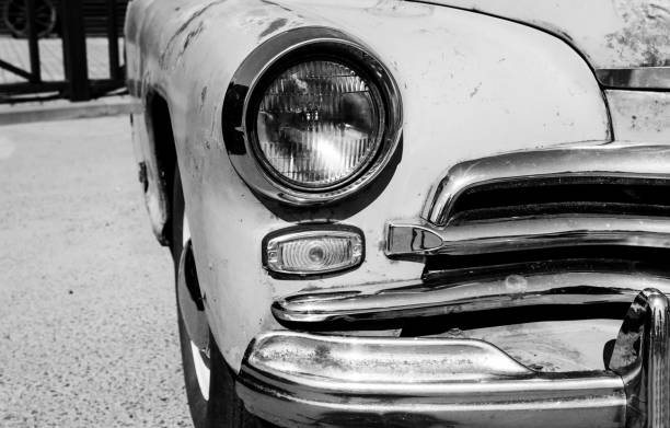 istock headlight of old retro car 1589420124