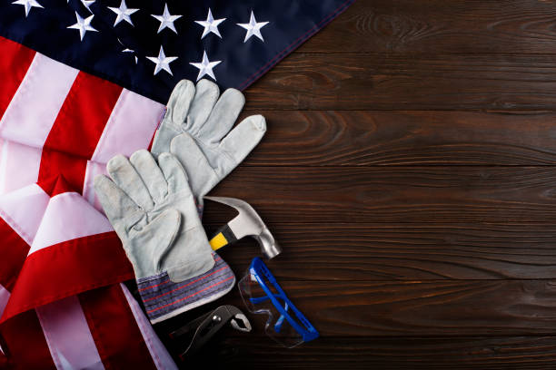 istock Tools and us flag on wooden background labor day banner mockup 1589425047