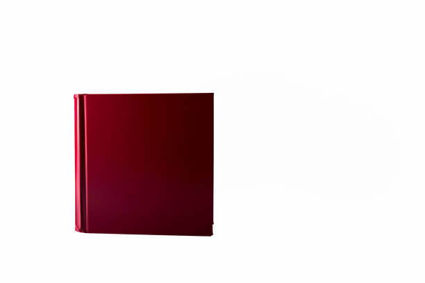 istock The image shows a red hardcover thick book lying vertically on a white background. 1589430325