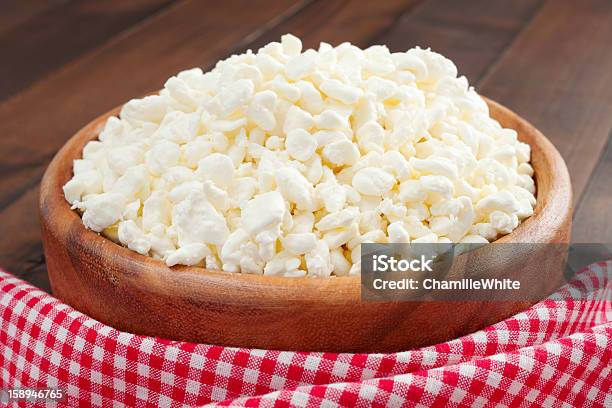 Cottage Cheese In Rustic Wooden Plate Stock Photo - Download Image Now - Bowl, Cheese, Cottage Cheese