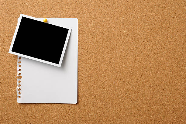 istock Blank Polaroid with memo pinned on cork board 158946941