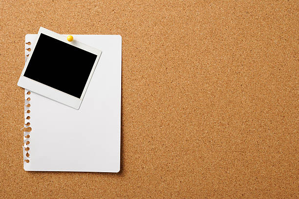 istock Blank Polaroid with memo pinned on cork board 158946944