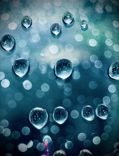 Cool raindrops on the window on a rainy day stock photo