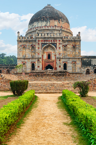 Awesome view of Bara Gumbad at Lodi Gardens in Delhi, India. The medieval monument is a popular tourist attraction of South Asia.