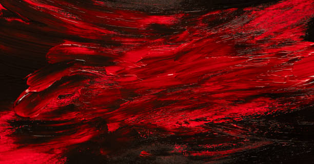 istock Mixing red and black paint 1589490506