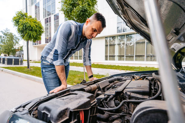 istock Young Man Having Car Problems On The Street 1589501707