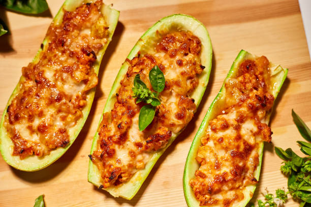 istock Stuffed zucchini on white background, baked loaded 1589516256