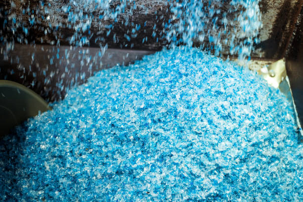 istock Shredded plastic garbage at waste recycling factory 1589533433