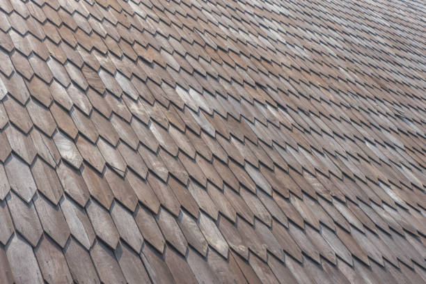 istock Roof shingles flat rectangular shapes ulin iron wooden material rooftop traditional culture Indonesia 1589534510