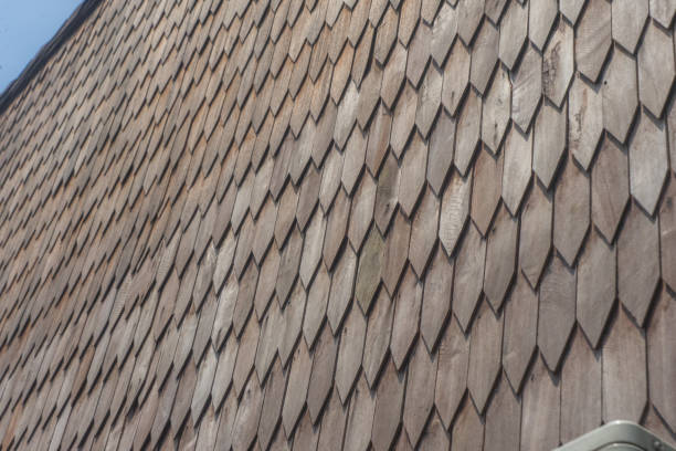Roof shingles flat rectangular shapes ulin iron wooden material rooftop traditional culture architecture Indonesia with clear blue sky