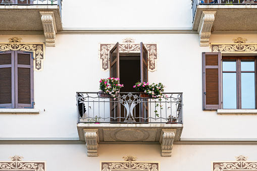 Balcony with flowers in Italy, in Baveno a charming town on Lake Maggiore in Piedmont.