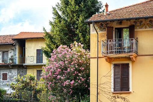 Balcony with flowers in Italy, in Baveno a charming town on Lake Maggiore in Piedmont.