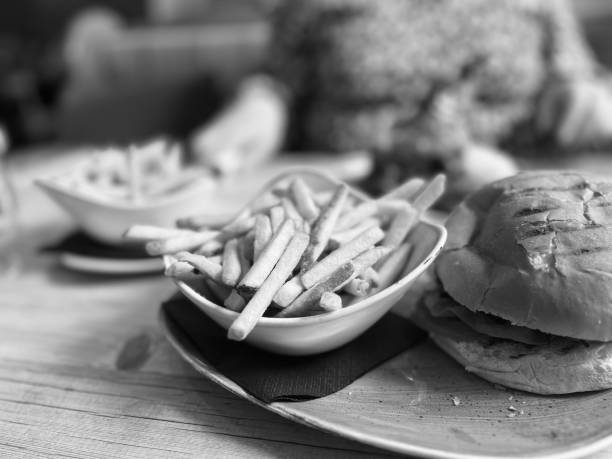 Burger and french fries on a restaurant table