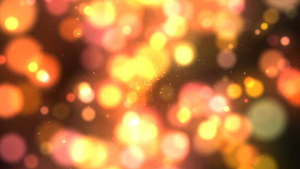 istock 4k Holiday Abstract shiny color orange and yellow glowing design element. Congratulation bright background. 1589565432