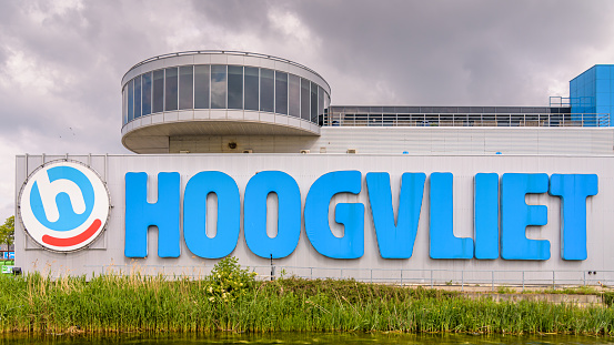 Alphen aan den Rijn, The Netherlands - May 16, 2020: The name Hoogvliet in large blue letters on the facade of the well-known supermarket