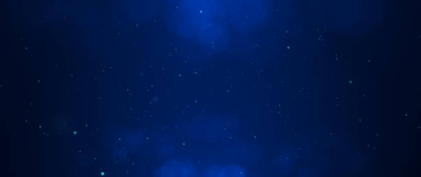 istock Banner dark blue bokeh particles glitter awards dust gradient abstract background. 1589573419
