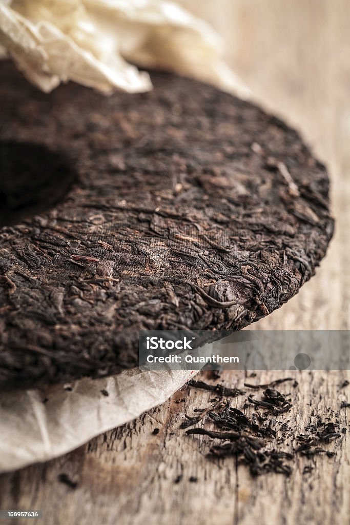 Pu erh tea cake - Foto de stock de Antigo royalty-free