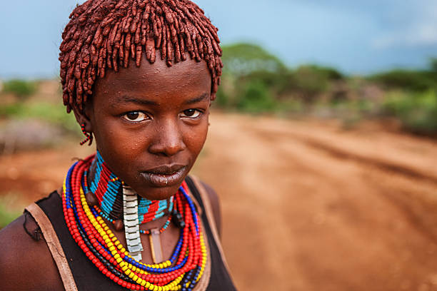 Portrait of woman from Hamer tribe, Ethiopia, Africa The Hamer tribe is an indigenous group of people in Africa, and this tribe lives in the southwestern region of the Omo Valley near Kenya, Africa. They are largely pastoralists. hamer tribe photos stock pictures, royalty-free photos & images