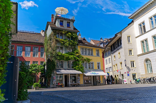 Cityscape with colorful facades of historic houses at the old town of Swiss City of Winterthur on a sunny spring day. Photo taken June 1st, 2023, Winterthur, Switzerland.