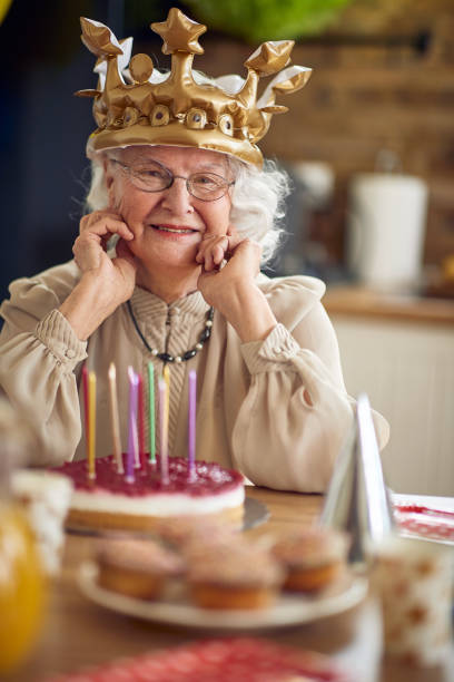 Grandma's Birthday Bliss: A Radiant Smile Amidst Cake