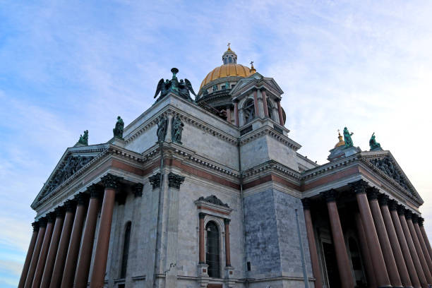 istock St. Isaac's Cathedral (Isaakievskiy Sobor) with golden dome against blue sky. 1589681069