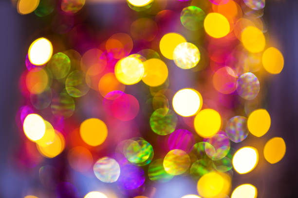 Abstract festive elegant background of blurred with bokeh lights and stars texture