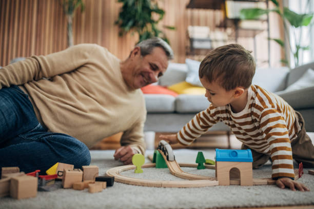 istock Man and grandson having fun 1589707966