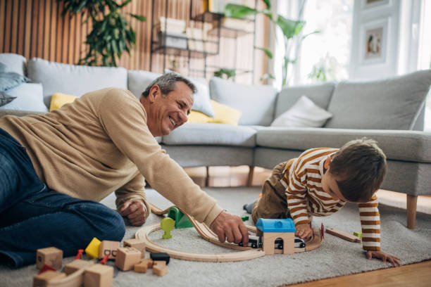 istock Man and grandson having fun 1589709564