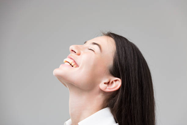 istock Happy woman, struck positively, smiles 1589743778