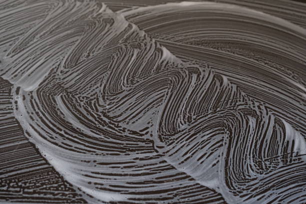 istock white and black abstract background. soap bubble drawing. soap suds abstract background. 1589751254