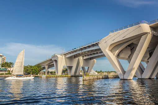 Fort Lauderdale, USA - August 20, 2014: modern bridge in Fort Lauderdale spanning the canal and constructed as draw bridge in Fort Lauderdale, USA.